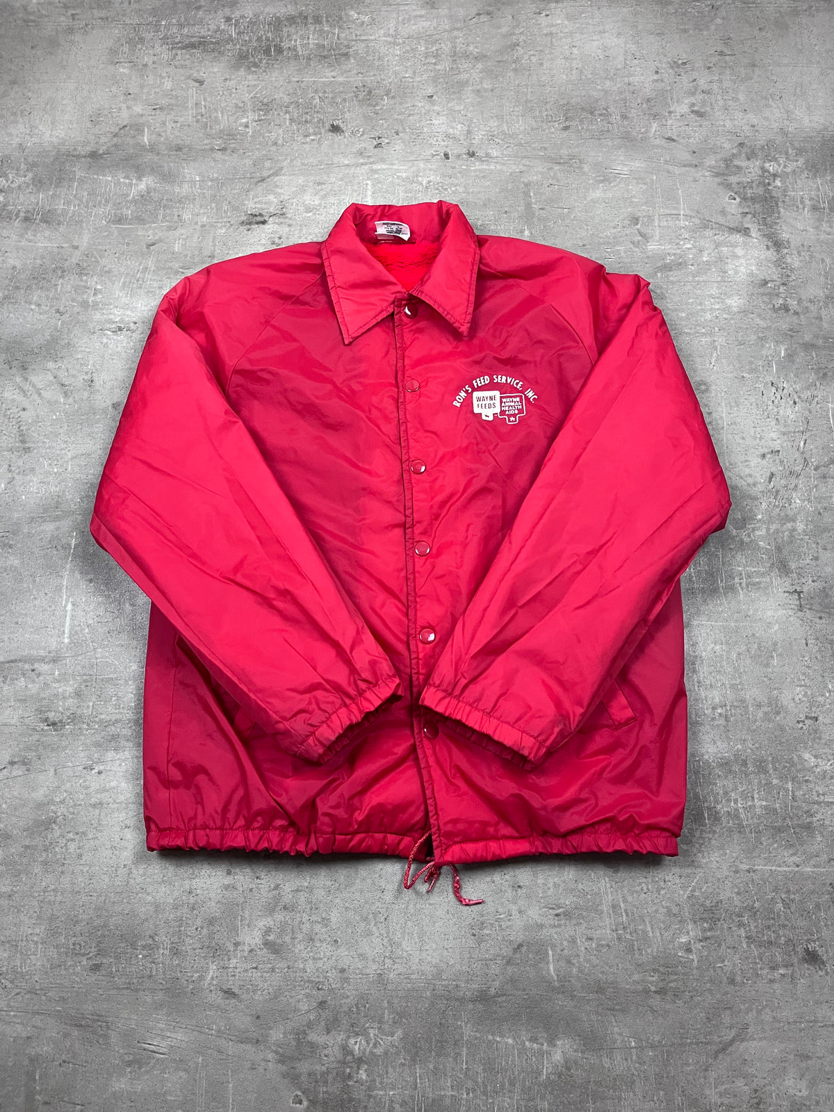 Vintage Wise Wear Coachjacke Ron’s Feed Service Rot 1